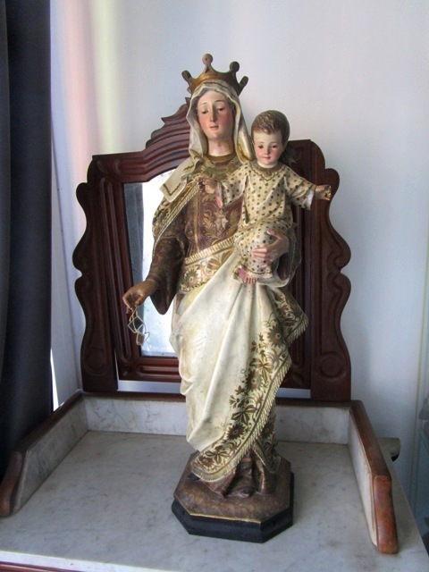 Restoration of wood carving of the Virgin of Carmen and Child Jesus